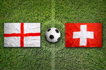 England vs. Switzerland flags on soccer field