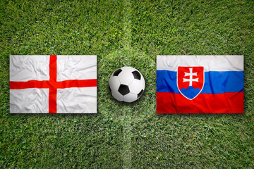 England vs. Slovakia flags on soccer field