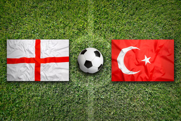 England vs. Turkey flags on soccer field