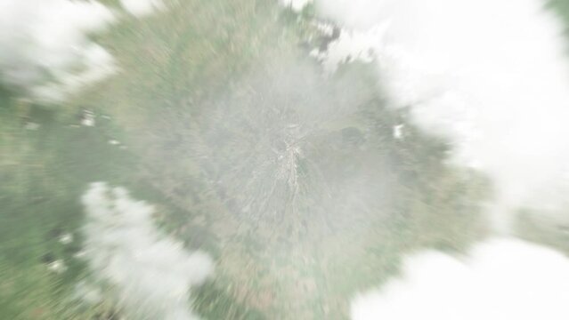 Earth zoom in from space to Goroka, Papua New Guinea. Followed by zoom out through clouds and atmosphere into space. Satellite view. Travel intro. Images from NASA