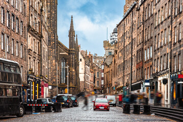 The cobbled street of Lawnmarket between old buildings along the Royal Mile in Edinburgh Old Town, Scotland