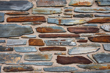 Nautical feel slab stone brick wall texture close-up 