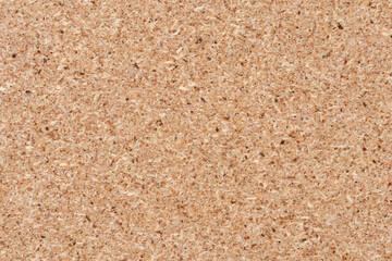 Brown textured cork board background. Textured wooden background. Cork board with copy space.