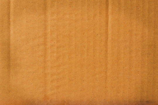 Abstract Wrinkled cardboard boxes, cardboard box texture, and background. Detail of brown paper box material.
