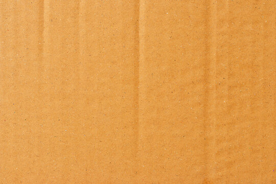 Abstract Wrinkled cardboard boxes, cardboard box texture, and background. Detail of brown paper box material.