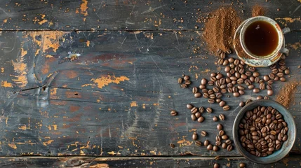 Foto op Canvas Coffee beans and coffee powder with hot coffee brewed on old wood. © matoya