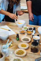 Natural soap workshop. Mixing ingredients to make soap