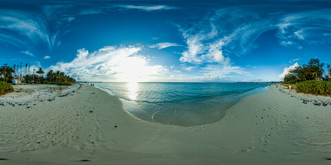 Beautiful 360 degree panorama at the beach of Trou Aux Biches Mauritius at sunset with a lot of ...
