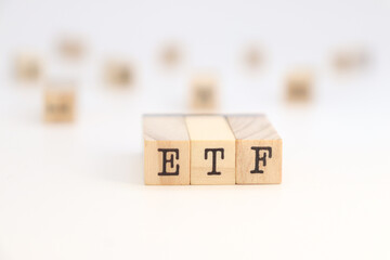 Acronym ETF (Exchange Traded Fund) isolated on wooden cubes.