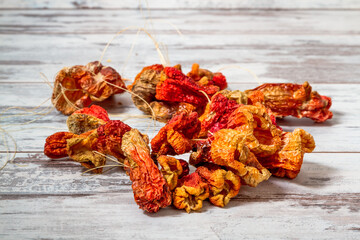 Dried Peppers for Stuffing Dolma, Turkish Traditional Food on White Wooden Background