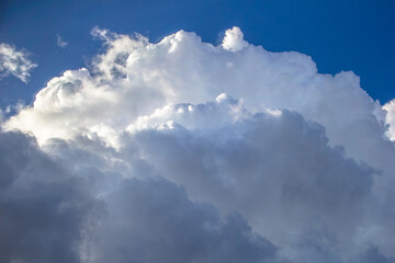 Fototapeta na wymiar cumulus clouds on the blue sky. Beautiful sky. Unusual clouds after rain. Cloudy sky.