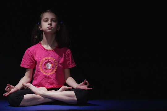 Meditation, yoga and zen of young girl in a wellness and health studio for mindfulness. Workout, praying and holistic exercise of an athlete for pilates relax with peace mindset and chakra. Copy space