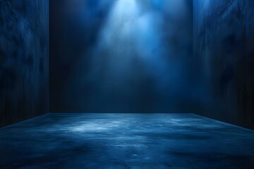 Spotlight illuminating empty dark blue room with concrete floor, perfect for dramatic or mysterious designs. Concept Dramatic Lighting, Urban Aesthetic, Minimalist Design, Mysterious Atmosphere