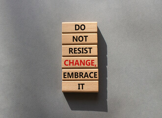 Do not resist change embrace it symbol. Concept words Do not resist change embrace it on wooden...