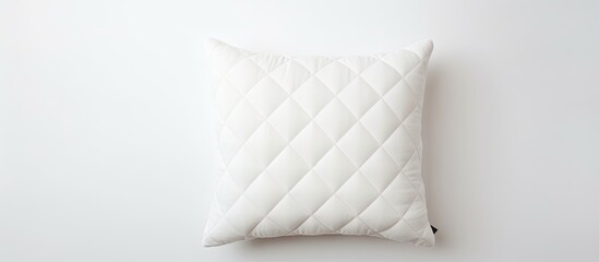 A soft cushion resting on a plain white tabletop