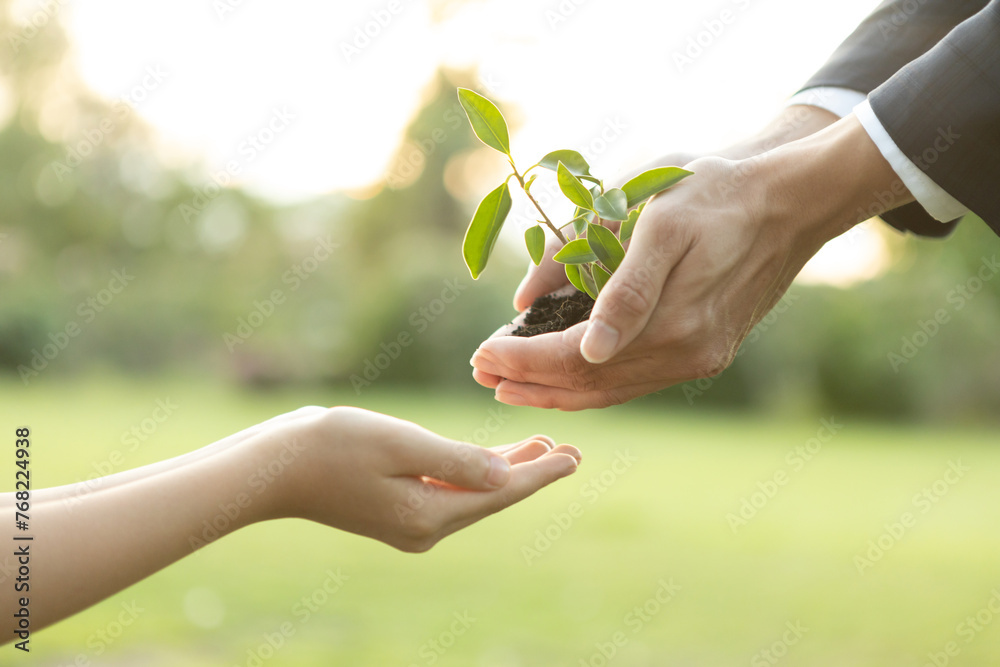 Sticker Businessman handing plant or sprout to young boy as eco company committed to corporate social responsible, reduce CO2 emission and embrace ESG principle for sustainable future.Gyre