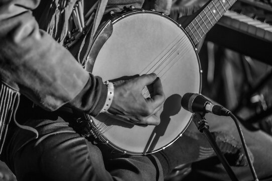 Guitarist playing banjo