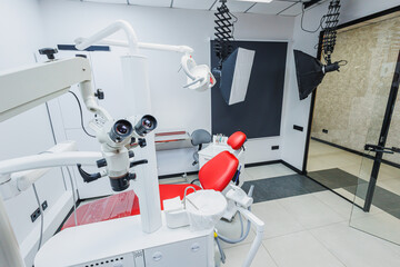 New empty dental office with dental chair for dental treatment. Tools for dental treatment