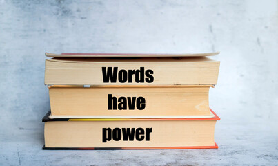 Words have power written on books 