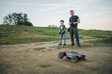Playtime outdoors with remote control cars.