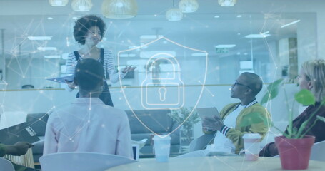 Image of padlock and data processing over diverse business people in office