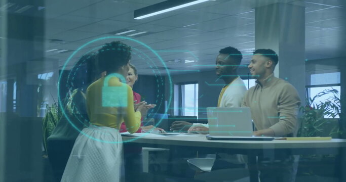 Image of padlock and data processing over diverse business people in office