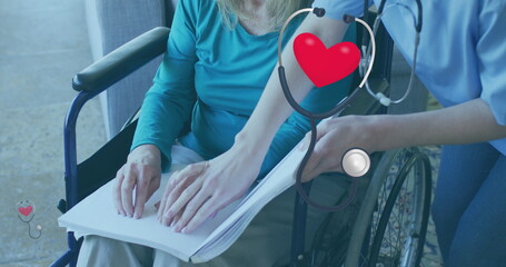 Image of sthetoscope with heart over caucasian nurse and patient reading braille
