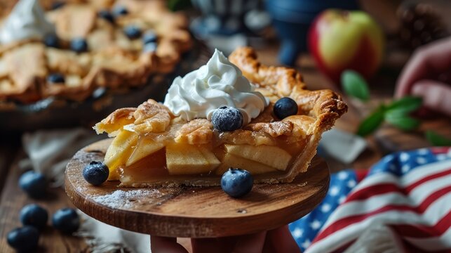 Slice of apple pie with whipped cream and blueberries on wooden plate. American cuisine and Independence Day concept