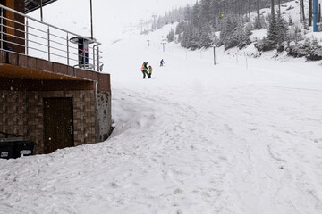 Dragobrat, Ukraine. March 18, 2024 The Carpathians are incredibly beautiful. heavy snow and fog. all the roofs and trees are covered with snow. a place of strength and rest