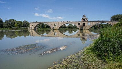Pont d'Avignon medieval bridge with chapel across Rhone river(Pont Saint Bezenett), popular tourist...