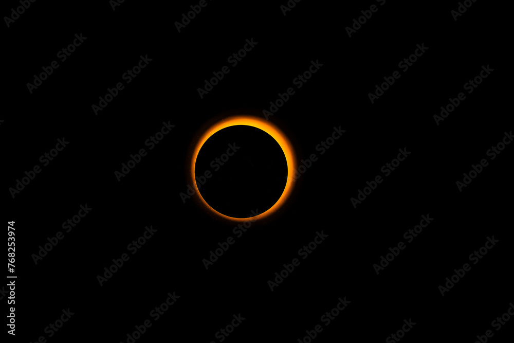 Wall mural eclipse re construction in a studio using a bright flashlight and a round cap with a bit of atmosphe