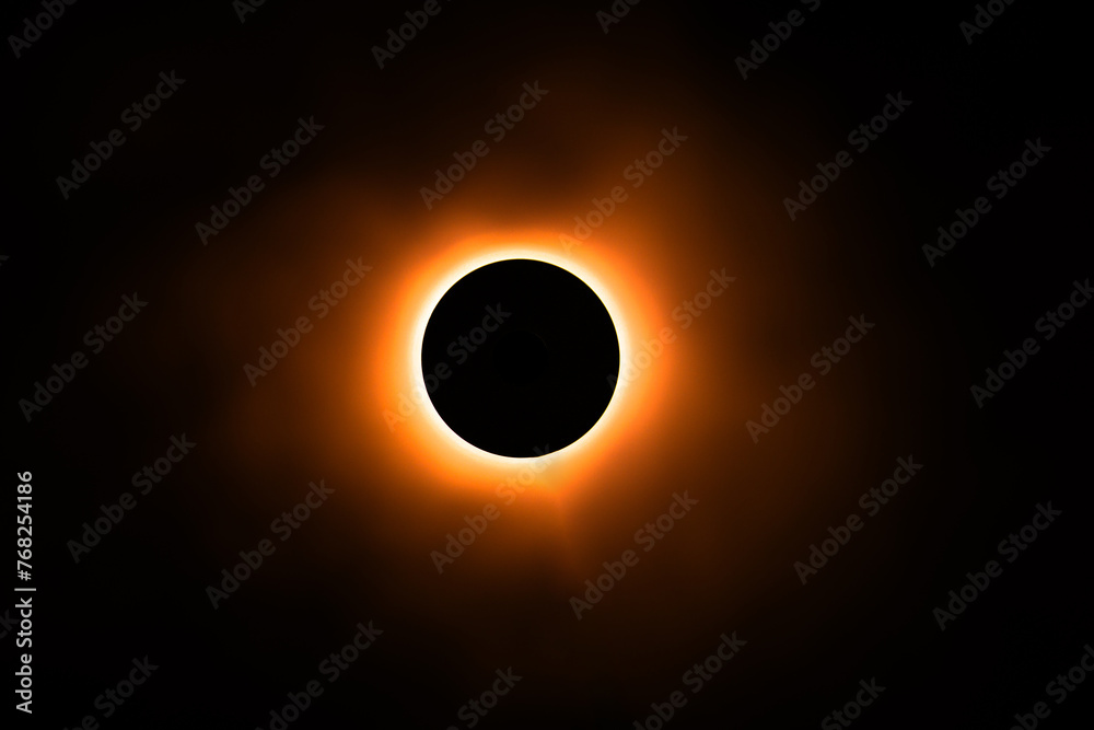 Wall mural eclipse re construction in a studio using a bright flashlight and a round cap with a bit of atmosphe