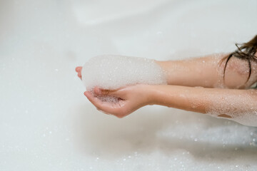 Fototapeta premium children playing with bubble bath