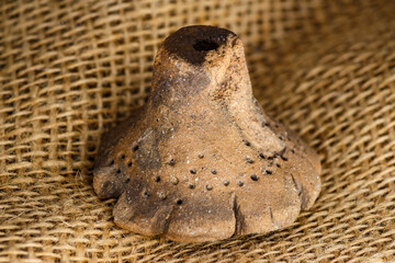 The Dyakov type weight is an archaeological clay artifact from the Early Iron Age. Central Russia