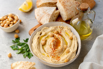 fresh hummus with paprika lemon pita bread and olive oil