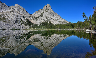 Fototapeta na wymiar Ragged Peak reflected in Lower Young Lake, Yosemite National Park, California. 
