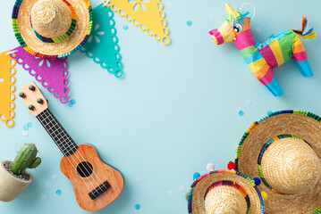 Cinco de Mayo display captured from top view, highlighting traditional pieces such as sombreros, a...
