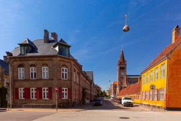 District Nyboder with yellow historic row houses and St Paul Church in Copenhagen, Denmark