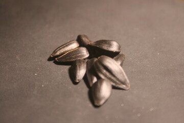 Fototapeta na wymiar sunflower seeds on wooden background