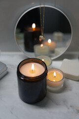 A tranquil home spa ambiance with candles, skincare essentials, and subtle floral touches, creating...