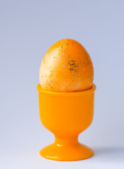 Colored egg. Traditional Easter food and decoration.