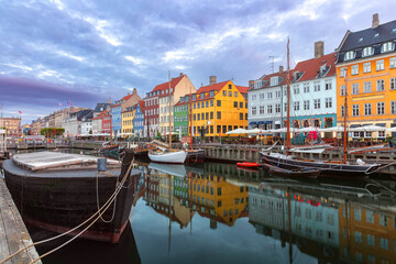 Nyhavn with colorful facades of old houses and ships in Old Town of Copenhagen, capital of Denmark. - 768282373