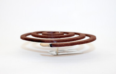 mosquito repellent coil with white isolated background