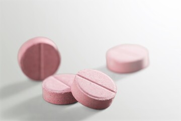 Obraz na płótnie Canvas Medical round pills on color background.
