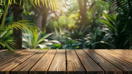 Foto op Canvas Empty wooden deck in foreground with a blurred background of fresh green leaves, symbolizing potential and growth © Daniel