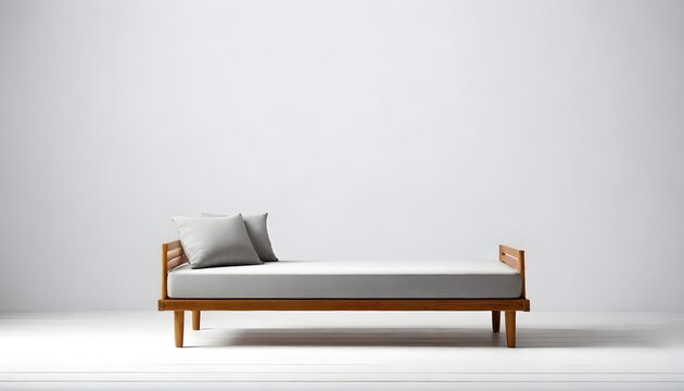 A modern wooden bed frame with a white mattress and a single white pillow against a plain white background, with a black duvet