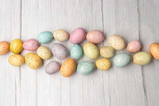 easter eggs on wooden surface