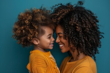 A mother and daughter are hugging each other with smiles on their faces - obrazy, fototapety, plakaty