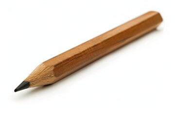 The simplicity of a single wooden pencil with a sharp point, positioned diagonally