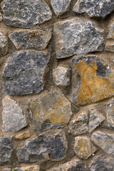 Stone wall as a background or texture. Part of a stone wall, for background or texture